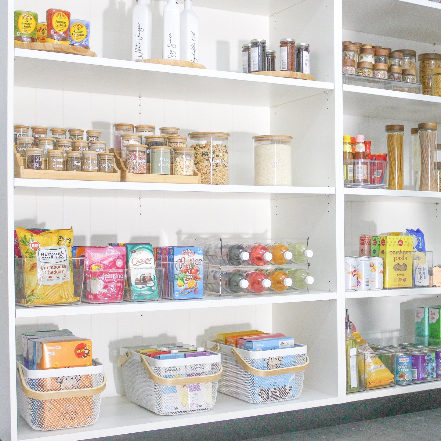 mesh metal basket with bamboo handle for home organisation, use in the kitchen, bathroom, laundry and more.