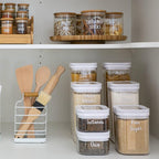 Organised pantry with White Flip Canisters holding pasta, rice, and other essentials.